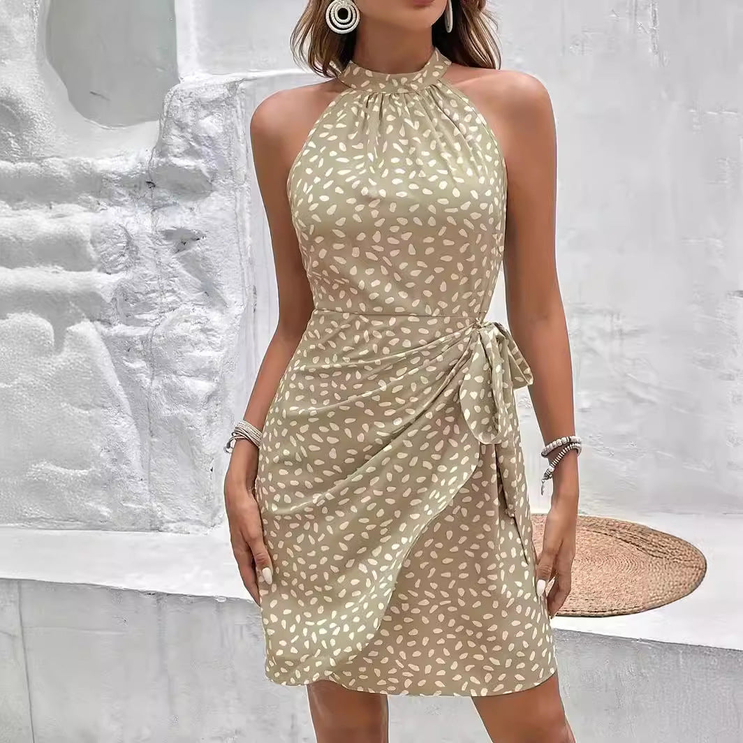 Black elegant women's halter neck wrap dress. Versatile and flattering, perfect for summer parties or casual wear.
