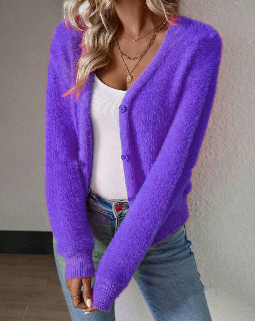 Elegant women's fluffy V-neck cardigan with sophisticated button details, a soft and cozy fashion statement.
