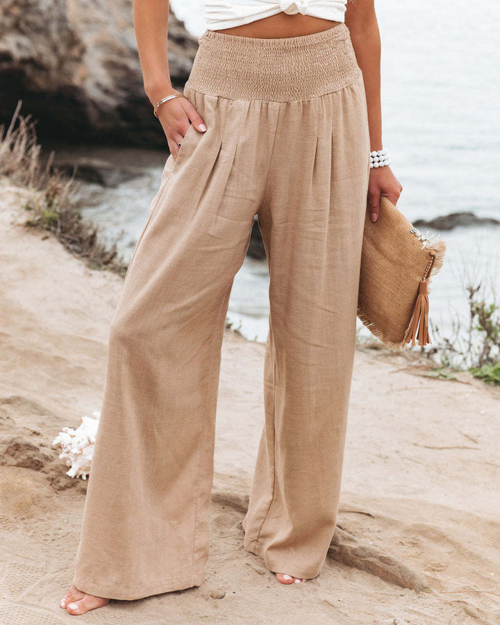 Women's high-waist wide leg pants, comfy elastic waist, relaxed fit for versatile casual wear.