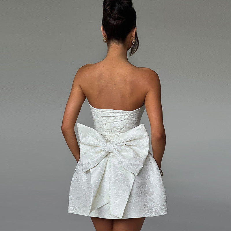 Textured strapless A-line mini dress for women. Ideal elegant cocktail or party wear.