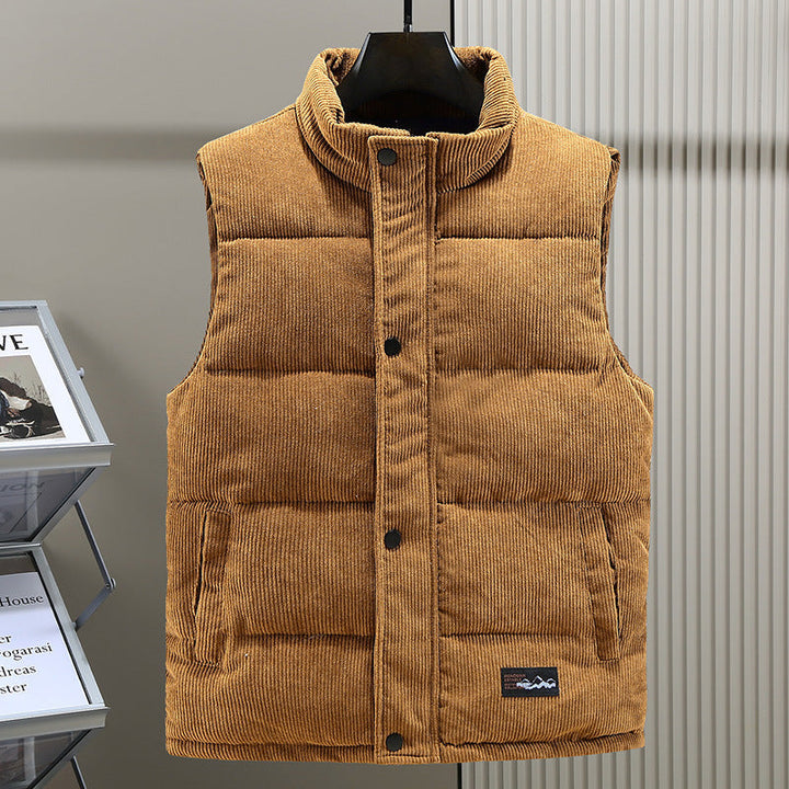 Men's quilted puffer vest with stand collar & snap closure for stylish winter layering.