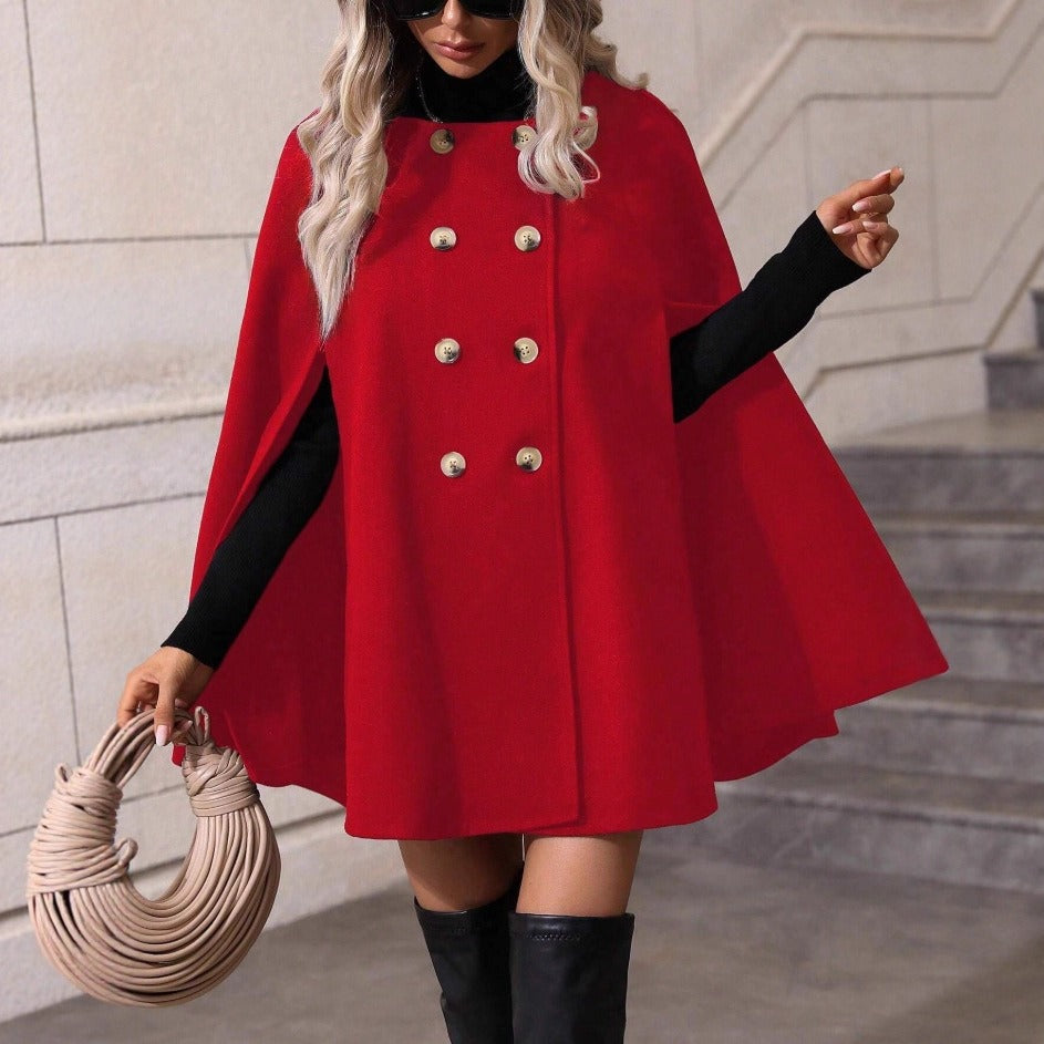 Fashionable women's double-breasted cape jacket. An elegant coat for a sophisticated and versatile style.