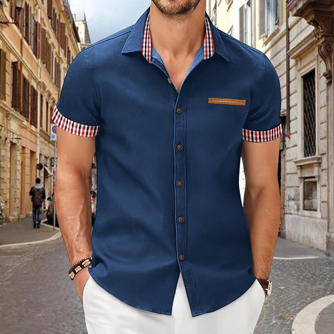 Comfortable men's summer shirt with short sleeves and chic contrast collar & placket, ideal for holidays.