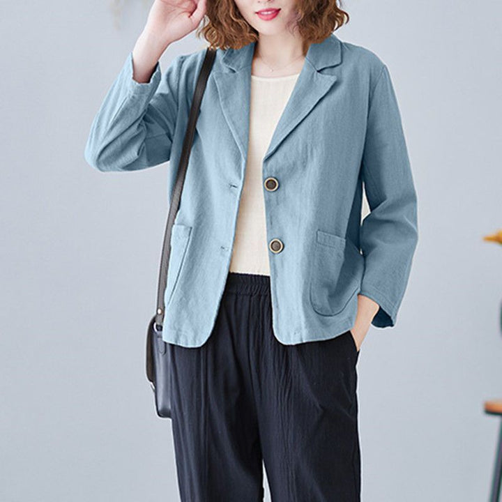 Modern women's business casual blazer, an elegant spring jacket featuring stylish contrast buttons for a chic look.