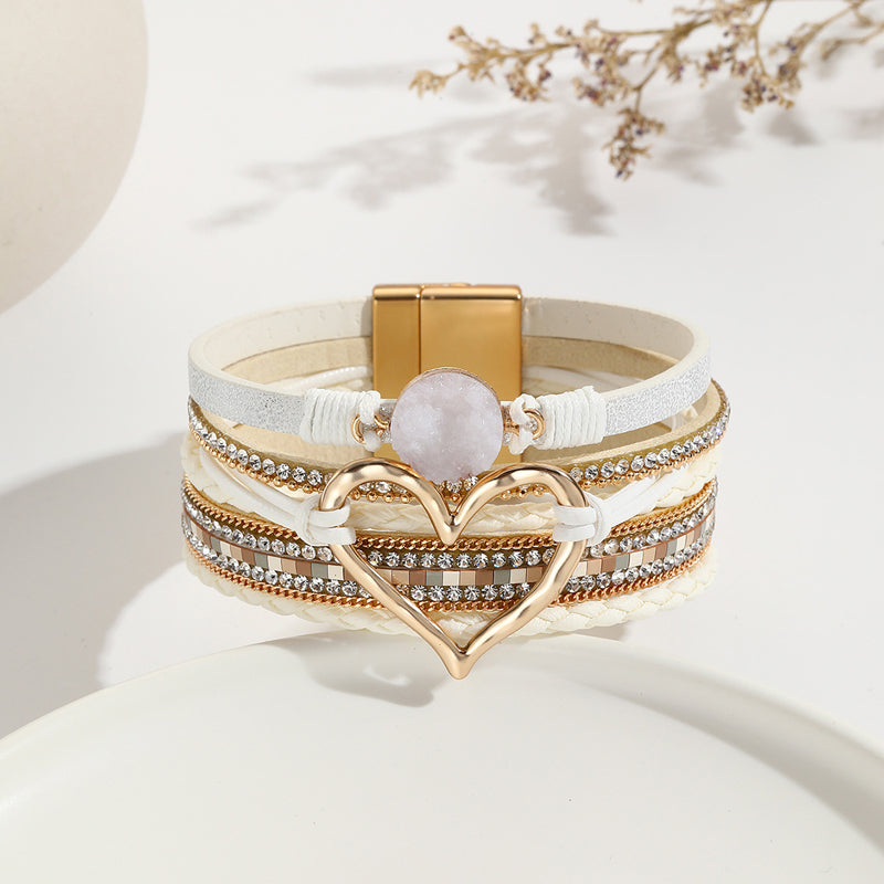 Handcrafted women's bohemian bracelet: natural stone beads, rhinestone details, and a charming heart.