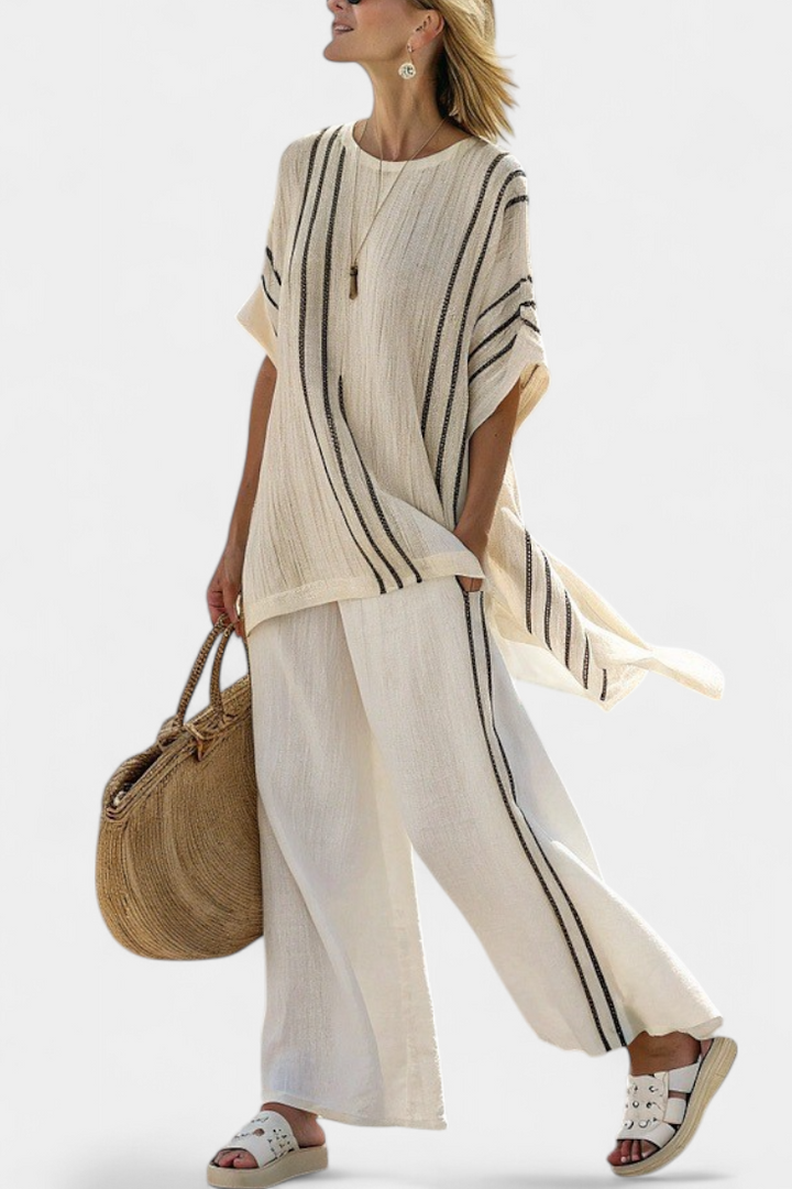 Women's elegant ivory blouse and black striped wide-leg pants two-piece set for a stylish and comfortable outfit.