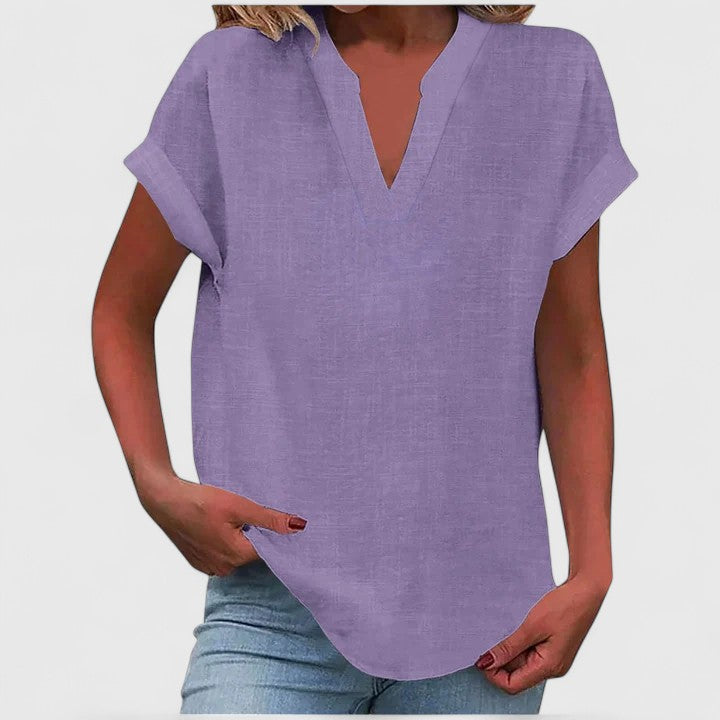 Breathable, relaxed fit V-neck top for women, perfect for warm weather.