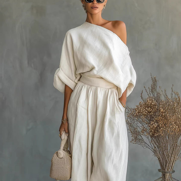 Cream one-shoulder loose fit jumpsuit for women, offering chic style and comfort for summer lifestyle.