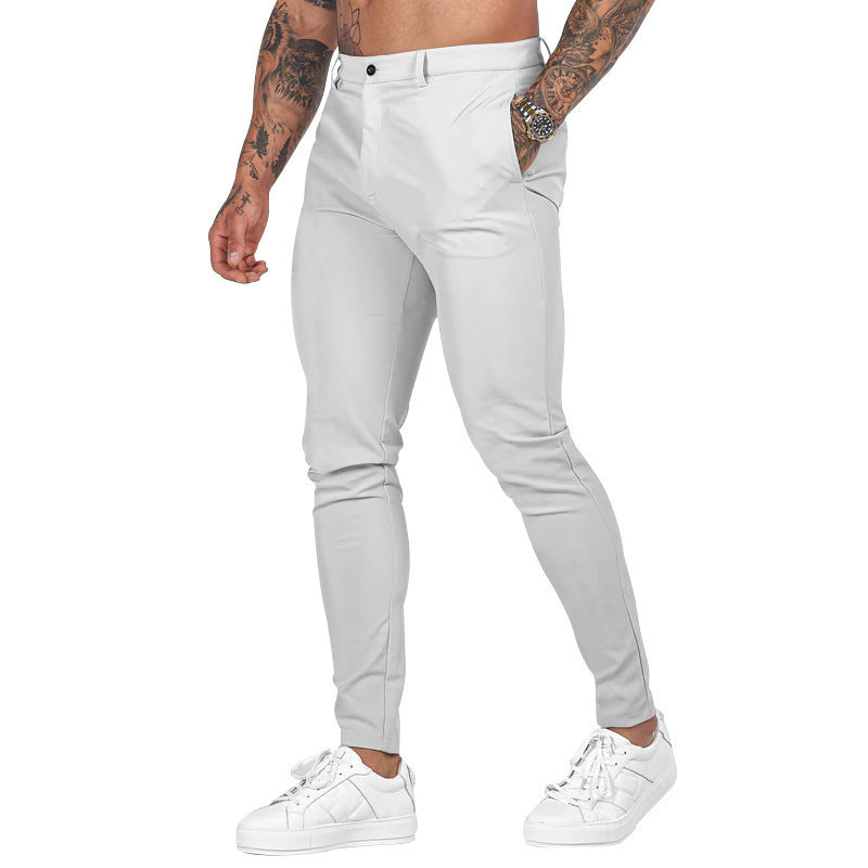Collection of Men's Slim-Fit Stretch Chinos in multiple colors: black, navy, khaki, grey, and brown.