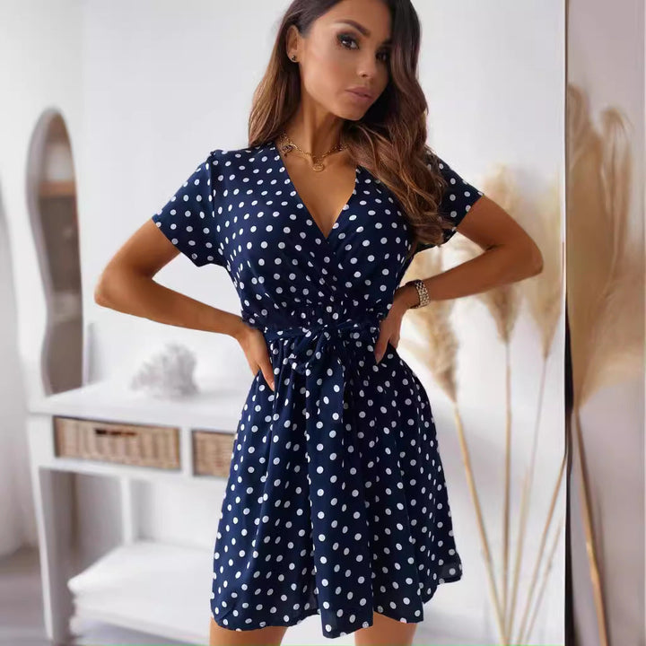 Versatile women's polka dot mini wrap dress; a playful short sleeve V-neck suitable for casual outings or evening parties.