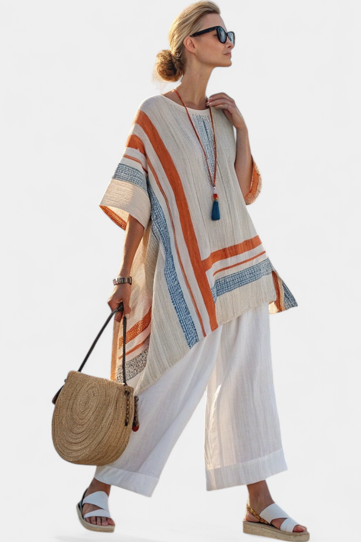 Fashionable women's asymmetrical top and wide-leg pant set. Effortless elegant comfort for summer vacation wear.