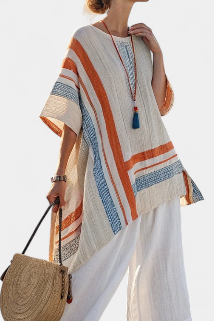 Elegant women's two-piece set with asymmetrical top & wide-leg pants. Ideal for casual chic coastal style.