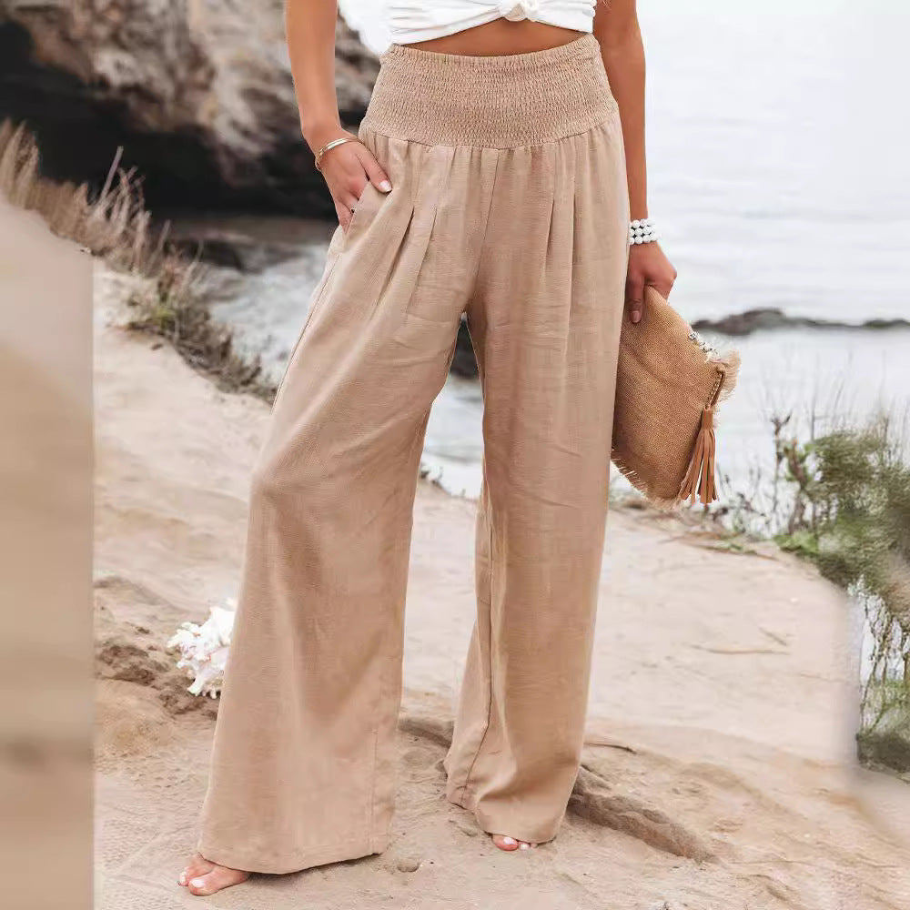 Comfy women's wide leg trousers, elastic waist, relaxed fit, perfect for casual or beachwear.