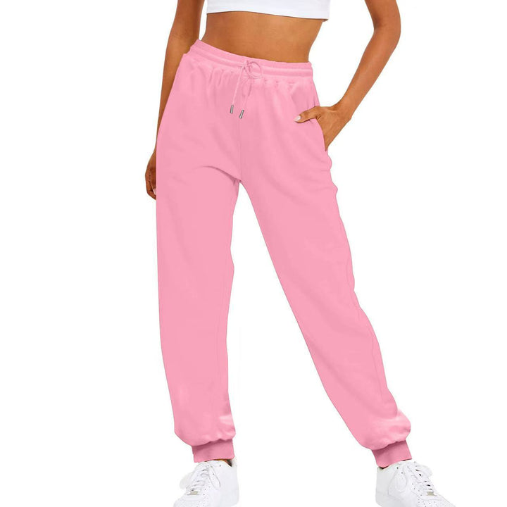 Performance women's sport pants, elastic waist & pockets. Excellent for workouts, gym, and outdoor jogging.