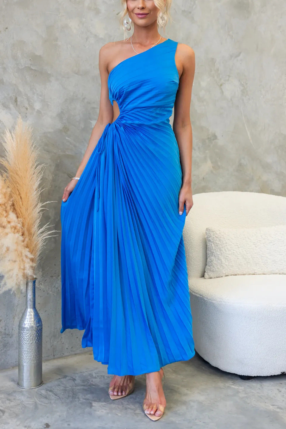 Chic blue one-shoulder maxi dress for women, featuring an elegant cut-out and tie waist, ideal for special events.