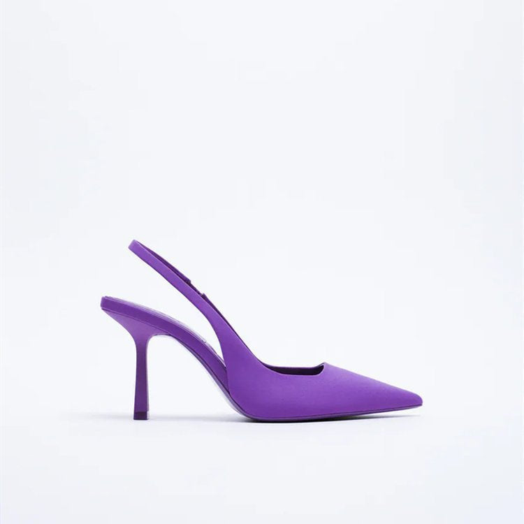 Chic women's pointed-toe slingback pumps. Modern heel design for elegant and versatile footwear.