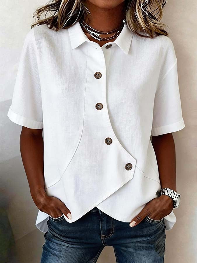 Trendy women's top, long sleeve, featuring a distinctive wavy pattern & unique button embellishments.