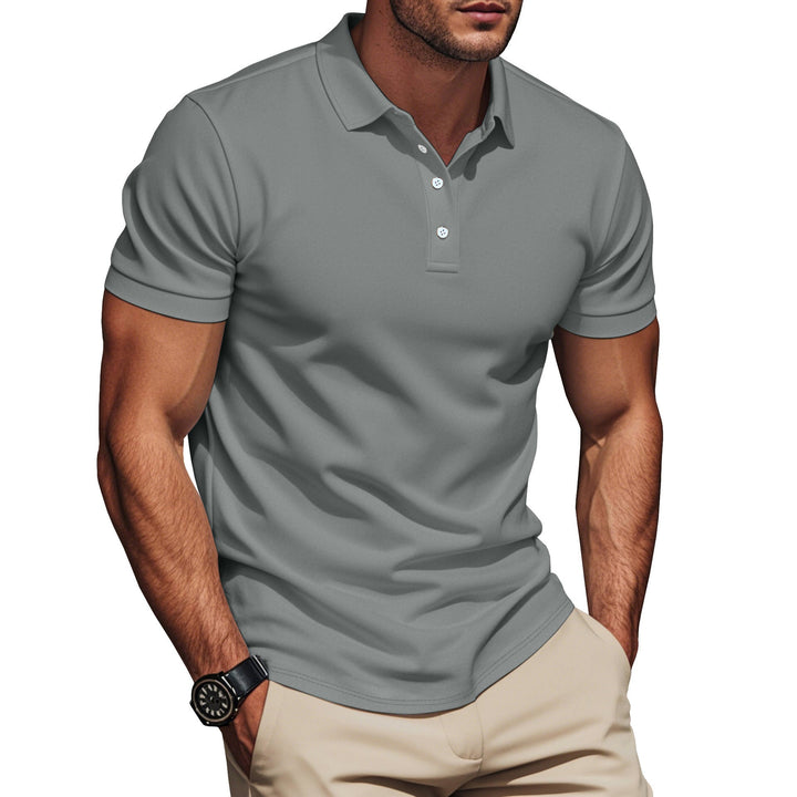 Versatile men's textured polo shirt. Comfortable short sleeve top, perfect for casual or smart casual outfits.
