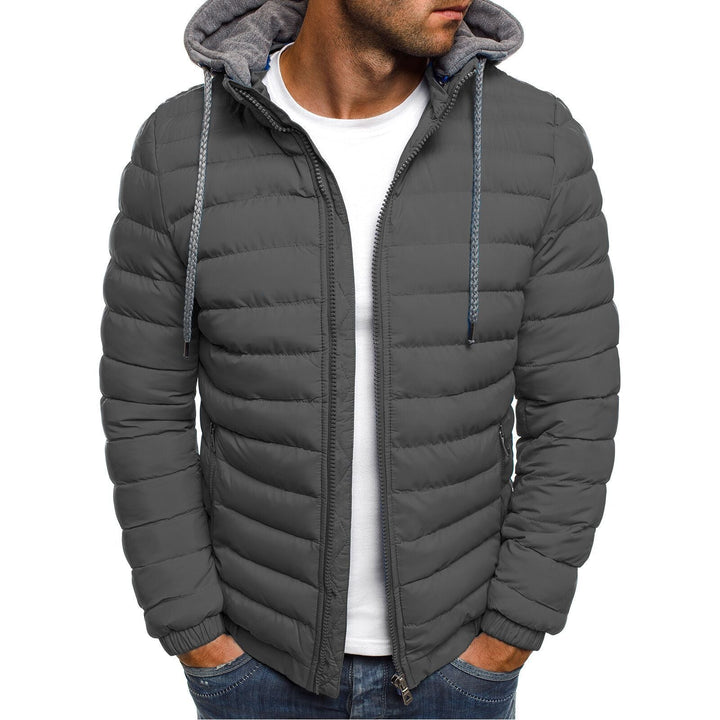 Lightweight men's quilted jacket with a removable hood, blending comfort, style, and seasonal versatility.