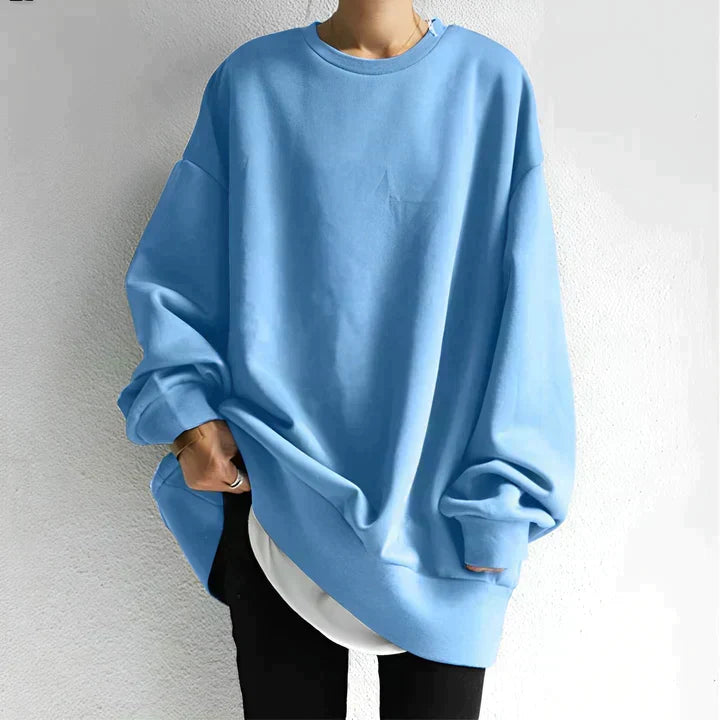 Oversized women's tunic sweater with drop shoulders. Comfortable long sleeve crewneck, great for fall fashion.