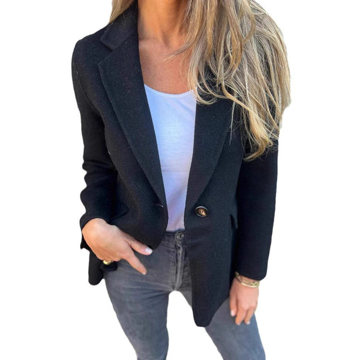 Relaxed fit women's blazer, a stylish top for elegant smart casual outfits & versatile fashion.