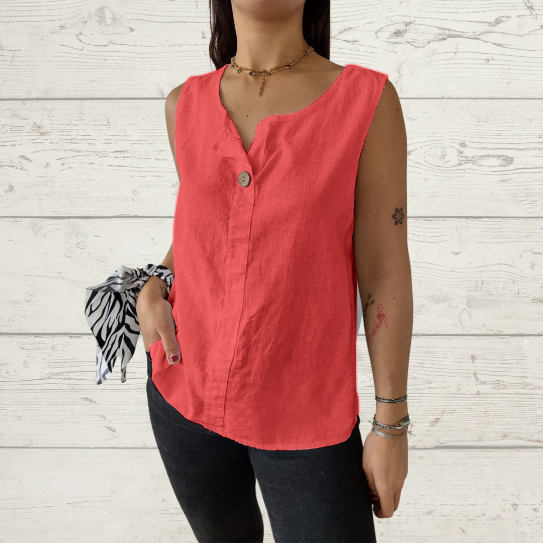 Modern women's sleeveless blouse, lightweight with button accents. Versatile choice for elegant summer outfits.