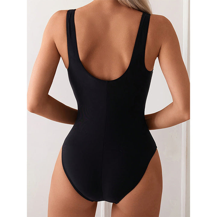 Women's elegant black square neck monokini swimsuit, perfect flattering one-piece for summer vacation.