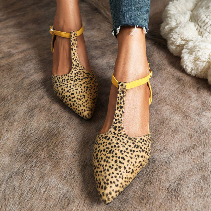 Chic Women's T-Strap Ballet Flats featuring a pointed toe and T-strap. Elegant and comfortable for versatile styling.
