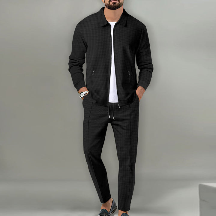 Comfortable men's sports tracksuit, perfect for active days or relaxing. Modern athletic outfit for ultimate ease.