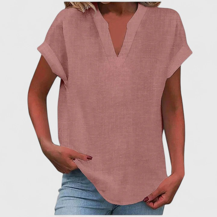Classic white V-neck blouse for women, comfortable and stylish for any occasion.