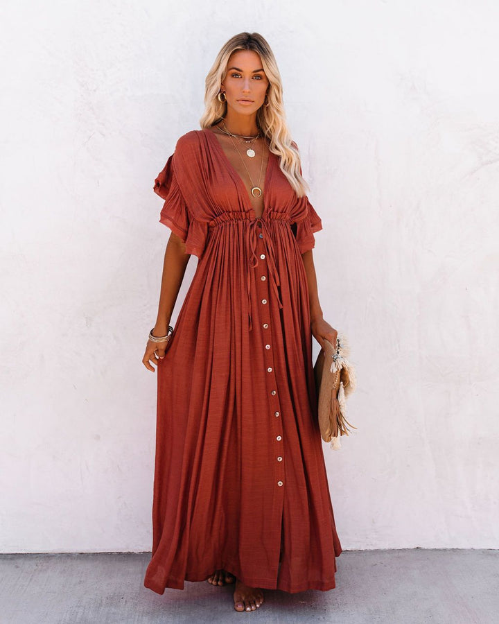 Vibrant Women's Boho Draped Maxi Dress, embodying bohemian style, great for summer parties or beach.