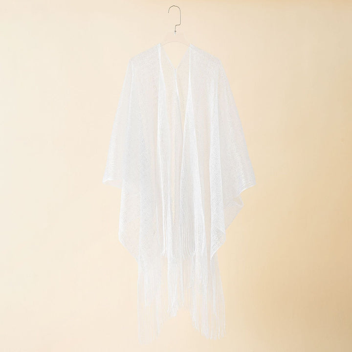 Flowy women's resort wear kimono with fringe, stylish and breathable.