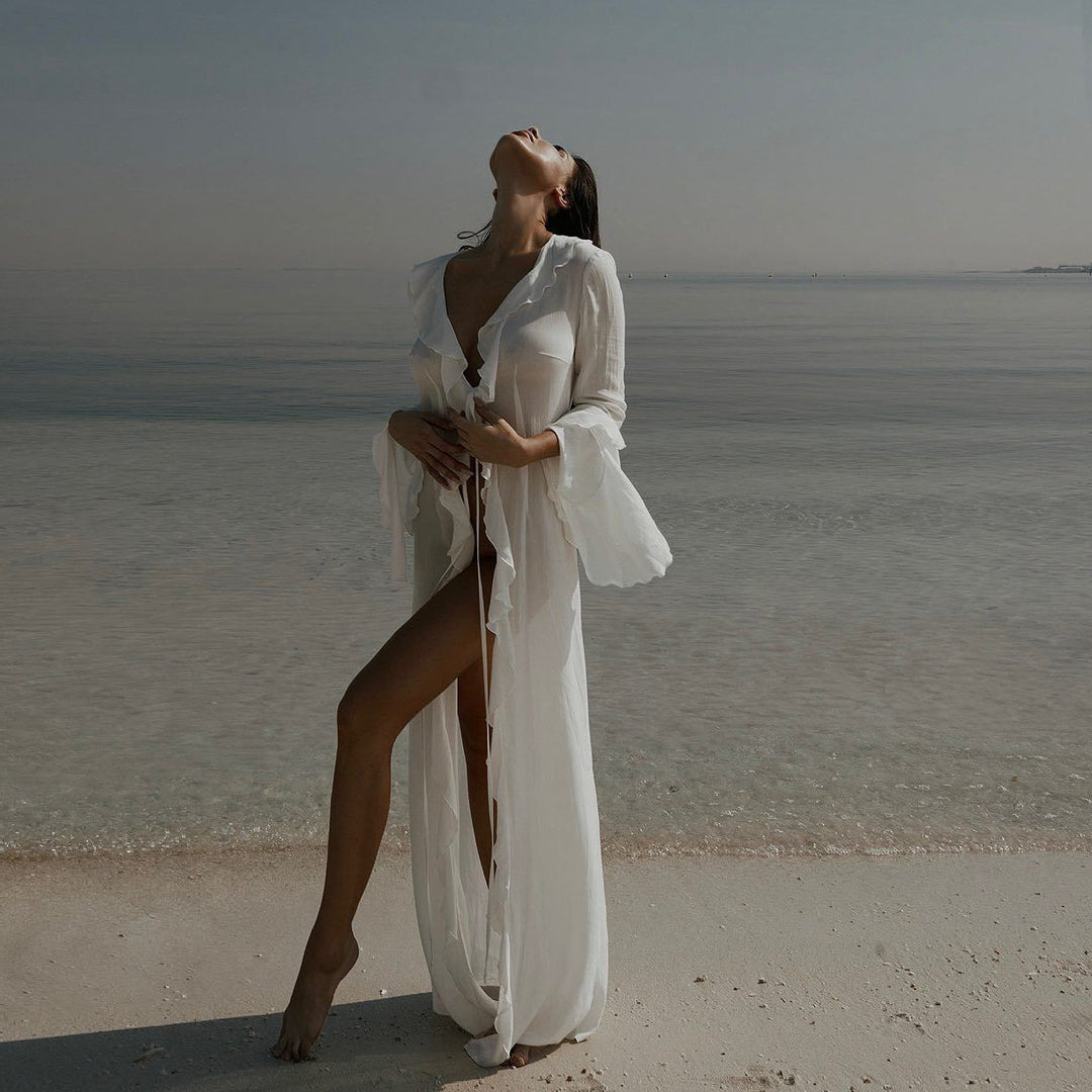 Stylish women's beach cover-up, ideal for resort wear or poolside. Lightweight, elegant summer swim robe dress.