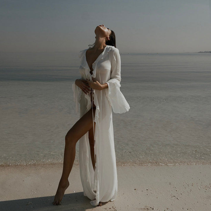 Stylish women's beach cover-up, ideal for resort wear or poolside. Lightweight, elegant summer swim robe dress.