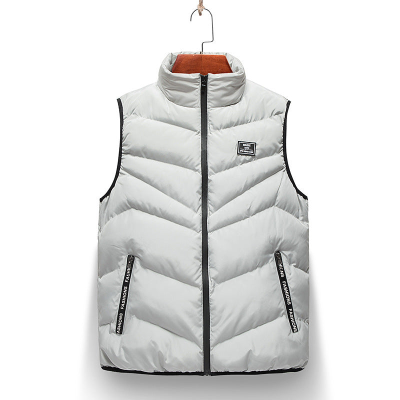 Women's quilted vest with a high collar and side zip pockets, perfect for autumn layering.