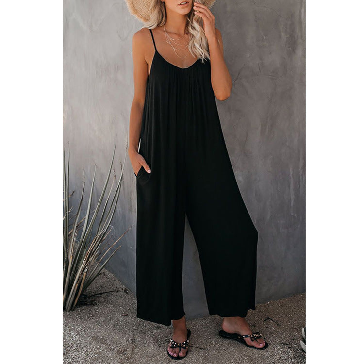 Women's casual summer jumpsuit: plunging neck, sleeveless, relaxed fit, stylish pockets, vacation ready.