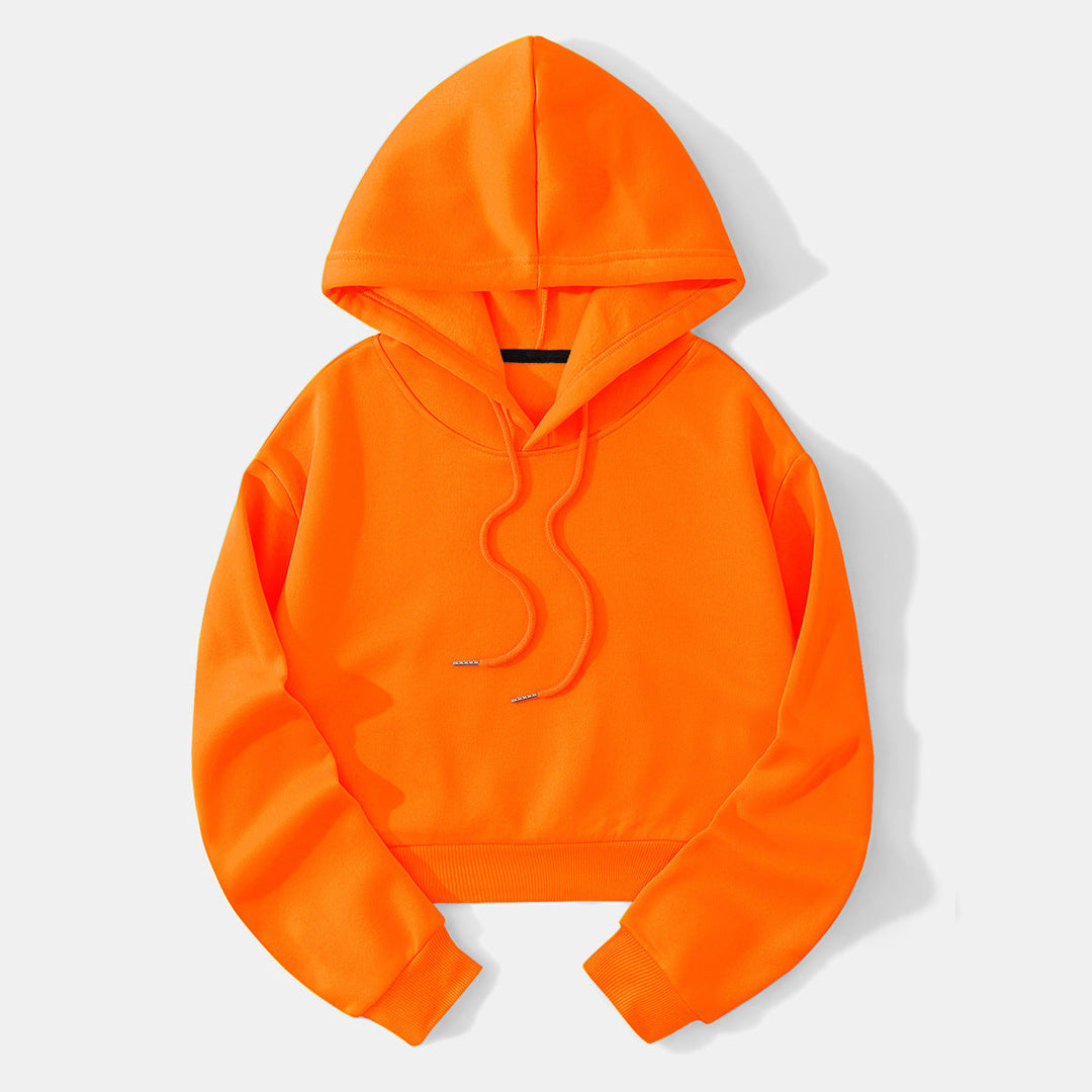Studio shot of a women's trendy cropped hoodie, highlighting quality and style.