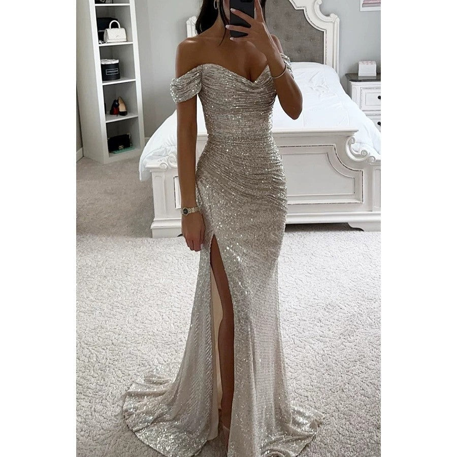 Women's elegant off-shoulder sequin maxi dress with a sophisticated thigh-high slit. Perfect evening wear.