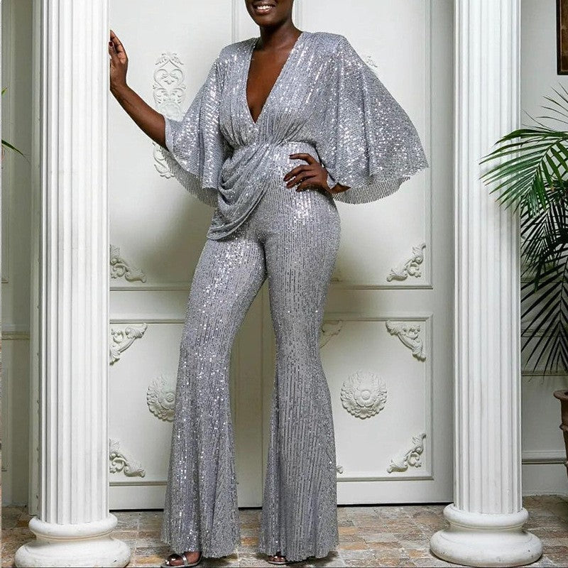 Dazzling women's sequin V-neck jumpsuit with wide-leg pants, perfect for glamorous party attire.