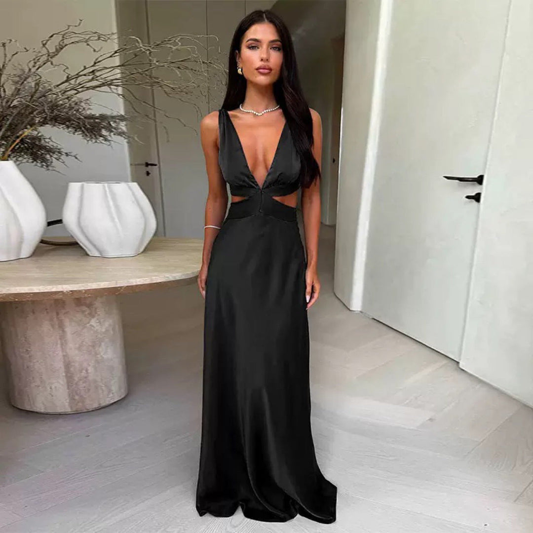 Chic women's party gown with deep V-neck and elegant cut-outs, ideal for special occasions.