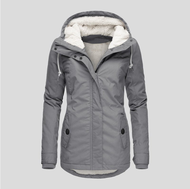 Stylish women's hooded winter coat, shown on model, providing ultimate warmth & cozy comfort for cold weather.