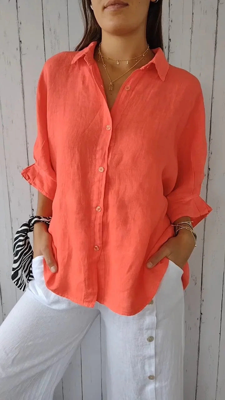 Fashionable women's light top, offering a comfortable loose fit for any casual look.
