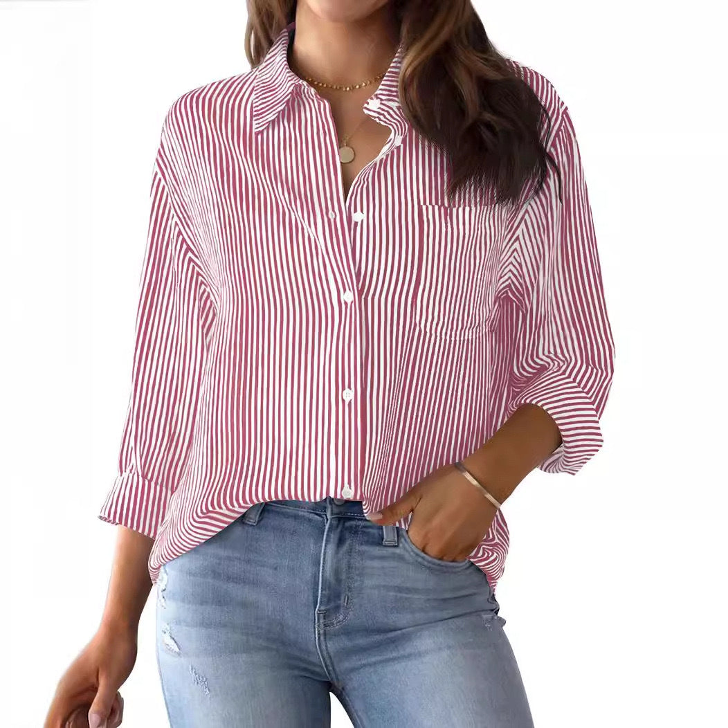 Versatile women's striped shirt with a chest pocket, perfect for a relaxed yet polished look.