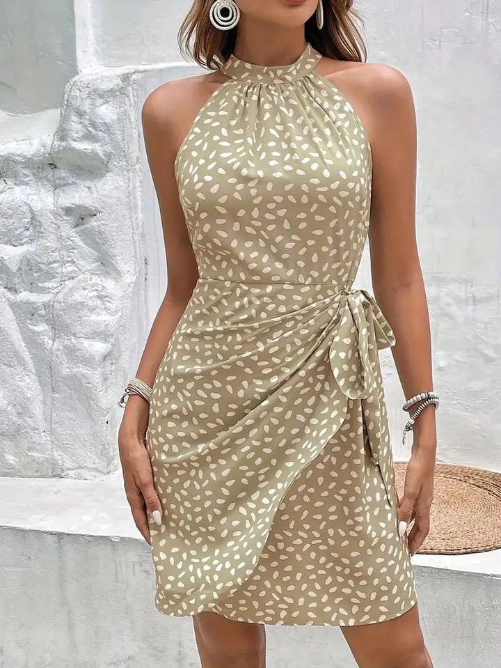 Sophisticated women's halter neck wrap dress. Elegant V-neck, high-waist, ideal for summer, parties, or casual.