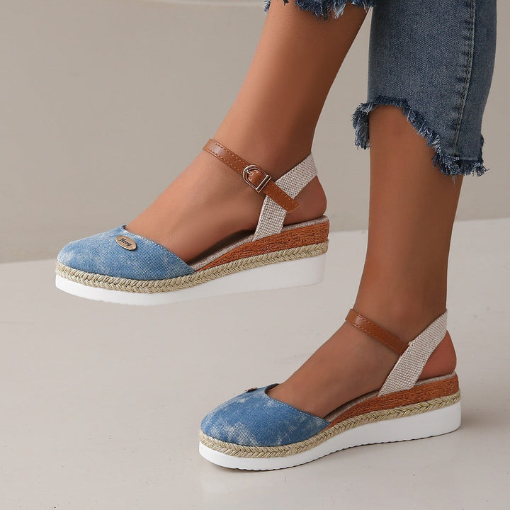 Stylish open-toe wedge sandals for women, ideal for casual wear & offering all-day comfort.