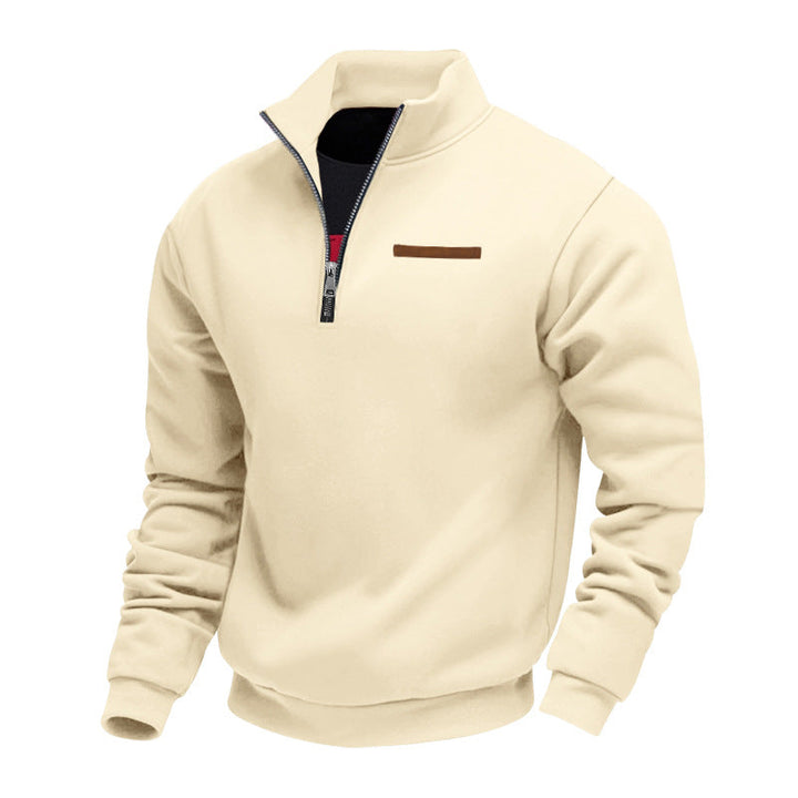 Side view of men's half-zip pullover sweatshirt, showcasing a relaxed fit for active comfort.