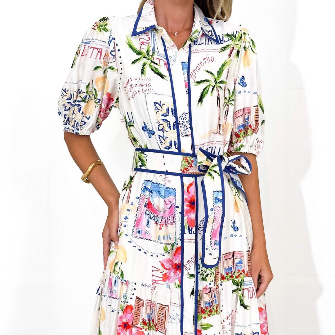 Women's airy maxi dress featuring a beautiful floral graphic print, practical pockets, and a comfortable, casual fit.