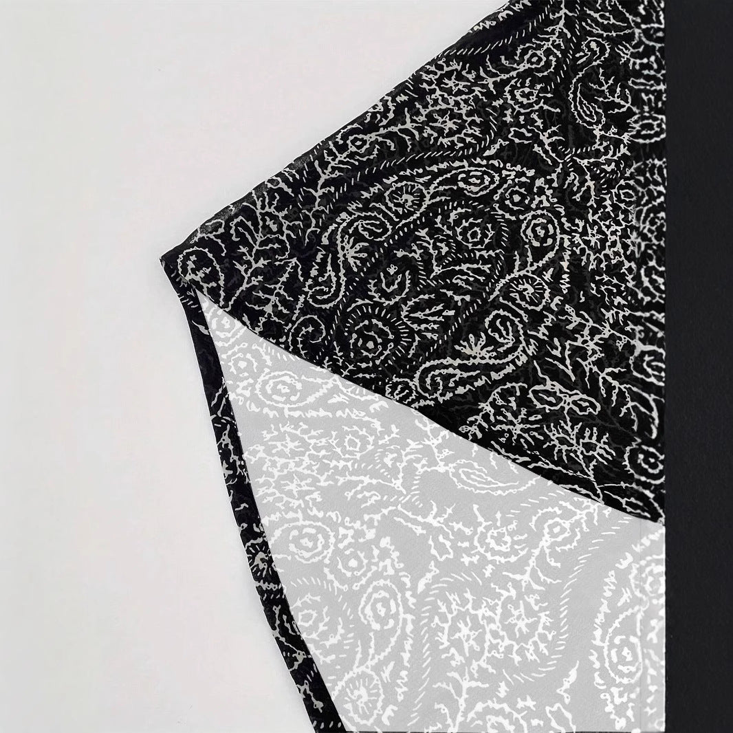 Casual fit black kimono jacket for women, featuring a trendy pattern. Stylish outerwear for summer fashion.