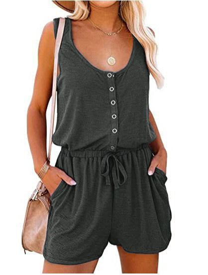 Elegant women's sleeveless jumpsuit, a comfortable one-piece summer outfit with a fashionable buttoned front and pockets.