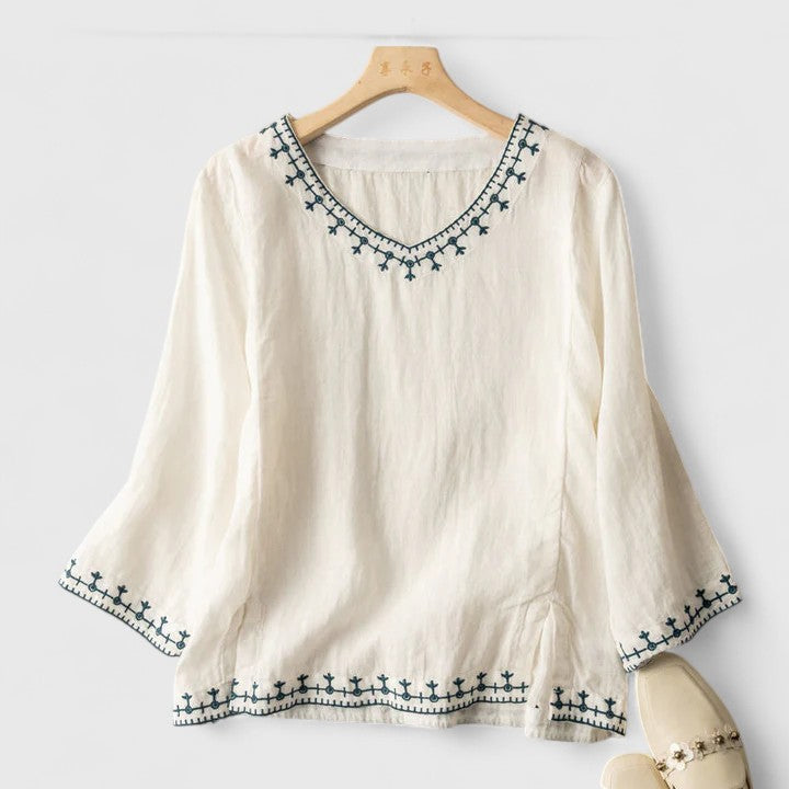 Comfortable long sleeve women's blouse with delicate embroidery, a lightweight and casual chic V-neck top.